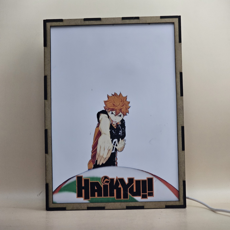 Lámpara ánime/manga  Haikyuu  con doble imagen del grupo Shoyo Hinata, Tobio Kageyama, Kei Tsukishima, Tadashi Yamaguchi, Kenma Kozume, Kuroo Tetsurō, Ryunosuke Tanaka, Yuu Nishinoya, Daichi Sawamura, Koushi Sugawara y Asahi Azumane, vista apagada, se esconde la imágen de atras.