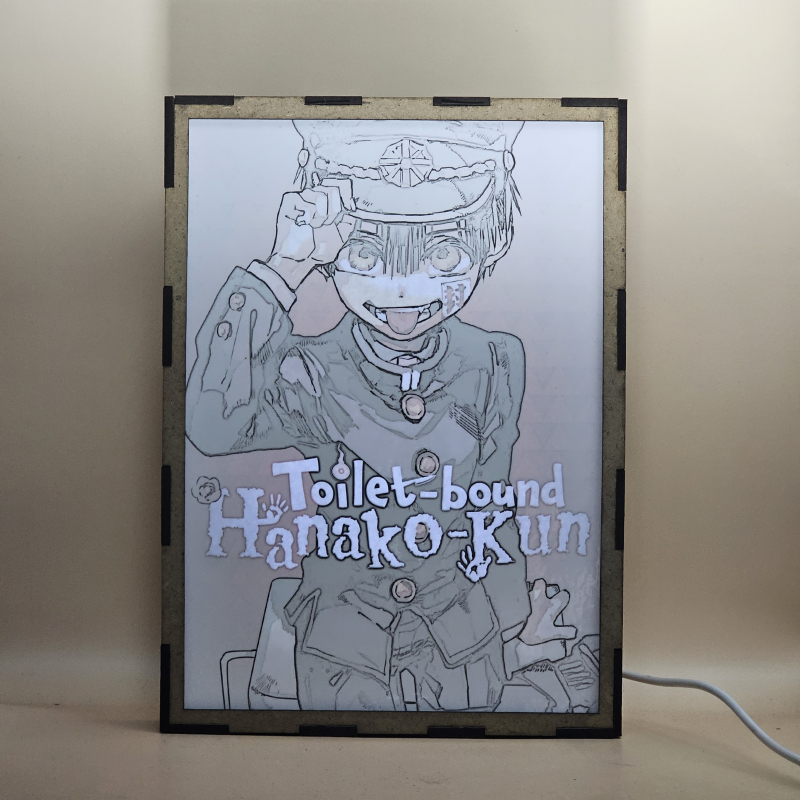 Lámpara ánime/manga  Jibaku Shōnen Hanako-kun  con doble imagen del personaje Hanako-kun, vista encendida, con luz ambiente, donde se revela la ilustración completa al encender la luz LED.