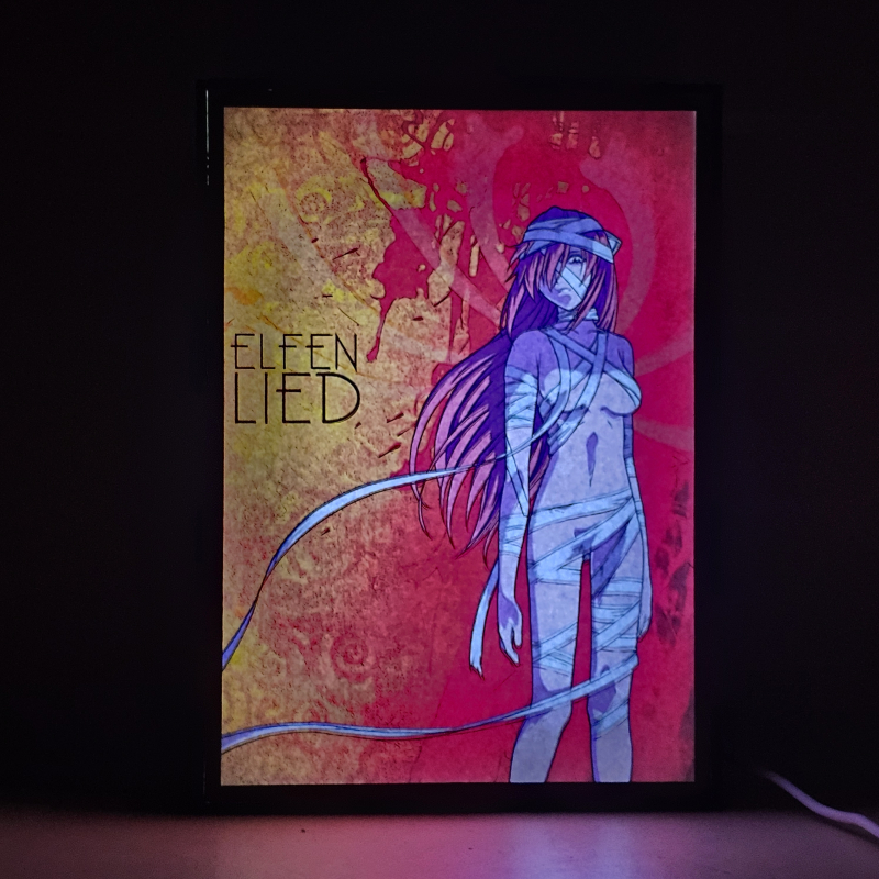 Lámpara ánime/manga  Elfen Lied  con doble imagen del personaje Lucy, vista encendida, donde se revela la ilustración completa al encender la luz LED.