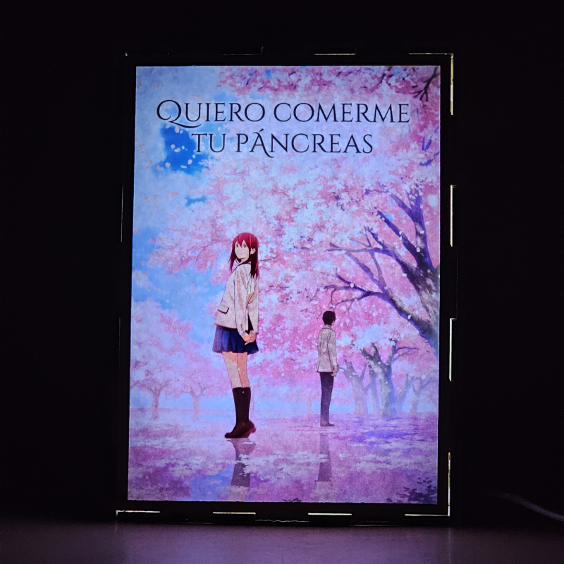 Lámpara ánime/manga  Kimi no Suizō o Tabetai  con doble imagen de la pareja Sakura Yamauchi y Haruki Shiga, vista encendida, donde se revela la ilustración completa al encender la luz LED.