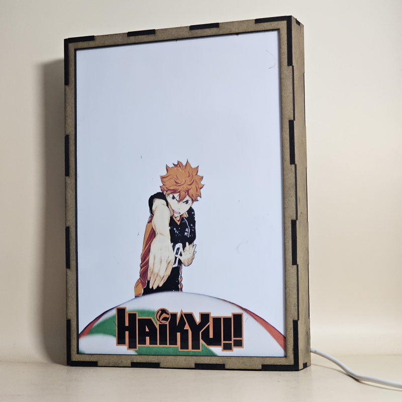 Lámpara ánime/manga  Haikyuu  con doble imagen del grupo Shoyo Hinata, Tobio Kageyama, Kei Tsukishima, Tadashi Yamaguchi, Kenma Kozume, Kuroo Tetsurō, Ryunosuke Tanaka, Yuu Nishinoya, Daichi Sawamura, Koushi Sugawara y Asahi Azumane, vista apagada, se esconde la imágen de atras.